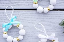 DIY wooden bead Christmas wreath ornament with bows