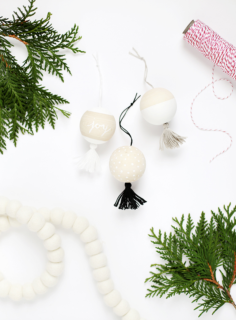 DIY wooden tassel Christmas ornaments (via themerrythought.com)