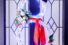 DIY lit up snowman Christmas wreath