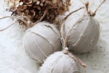 wrap your Christmas ball ornaments with white burlap, twine, pearls for a super chic rustic look