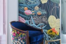 02 a bold and refined chair with a deep blue seat and floral back with bold patterns will add chic and texture to your room