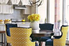 04 chic wingback chairs with bright yellow printed backs and navy seats and fronts are a fresh take on traditional aesthetics