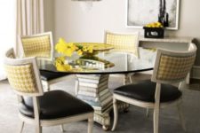 05 catchy chairs with black leather seats and yellow print backs plus a nail trim look contrasting and make the space wow