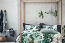 a stylish bedroom with botanical prints