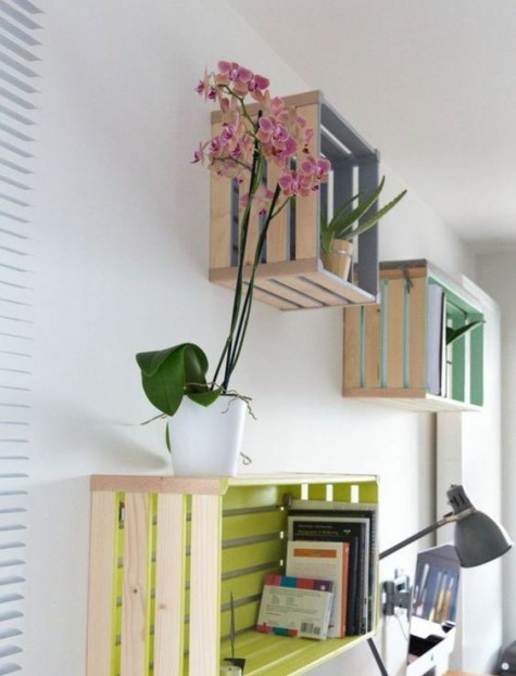 Knagglig boxes painted in bright colors inside and attached to the wall can serve as cool open shelves