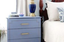 08 a blue Tarva hack with painted inlays, brass handles and catchy legs for a coastal bedroom