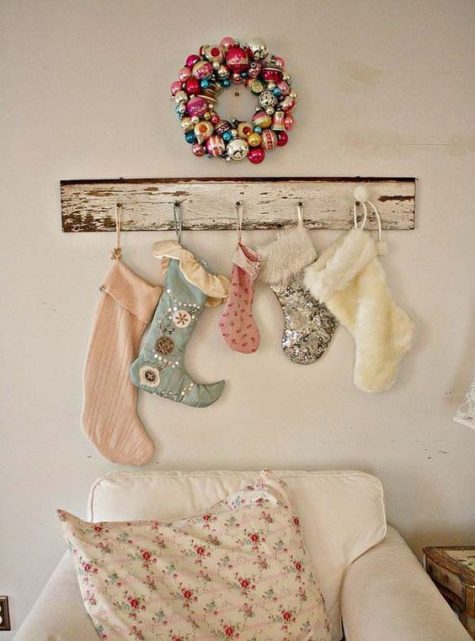 a cute vintage stocking display with printed vintage stockings and a shabby chic holder looks cute and stylish