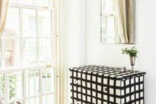13 a black and white check print Tarva dresser is a unique statement piece for any modern or contemporary space