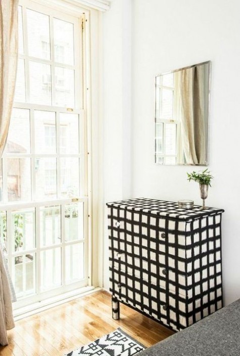 a black and white check print Tarva dresser is a unique statement piece for any modern or contemporary space