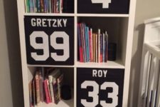 15 a cool boys’ storage piece with black Drona boxes labeled with numbers is a simple and fun idea
