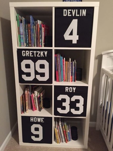 a cool boys' storage piece with black Drona boxes labeled with numbers is a simple and fun idea