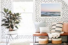 17 bright polka dot printed wallpaper is paired with more neutral and simple geometric prints and stripes