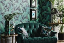 20 moody tropical print wallpaper sets the tone in the room and small tropical print pillows continue the theme