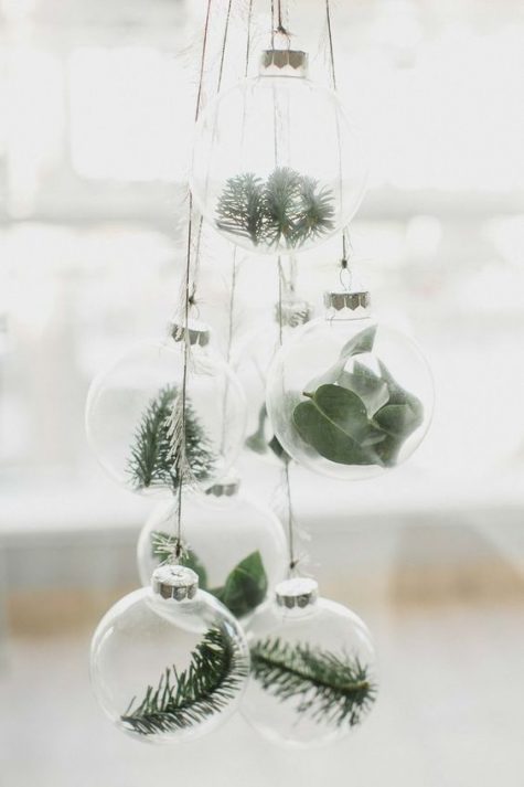 minimalist Christmas ornaments – sheer glass ones with fresh greenery and evergreens feel very natural