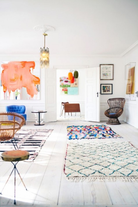 a bright open layout in bold colors and prints here and there that create an ambience