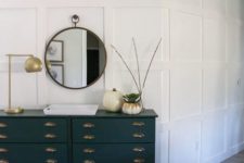 24 an elegant vintage Tarva hack in black, with vintage handles for a chic and stylish entryway