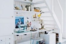 a little Nordic home office done with open shelving, a floating desk, a little cabinet and a storage unit with drawers plus some bright touches
