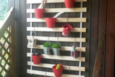 an outdoor hack for a balcony with an ikea bed frame