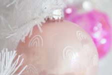DIY light pink Christmas ornaments with rainbows