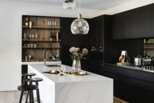 06 a gorgeous minimalist kitchen with sleek black cabinets, a white marble kitchen island and a wooden shelving unit