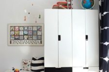 06 black and white Stuva cabinets, one of them forming a daybed, which is a great idea