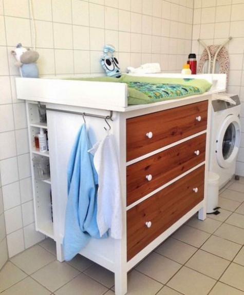 a Hemnes dresser with stained wood drawers, a comfy top and side open shelves for a changing table
