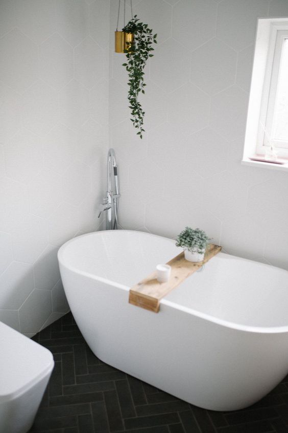 an oval free-standing bathtub is what you need to soak and relax very well