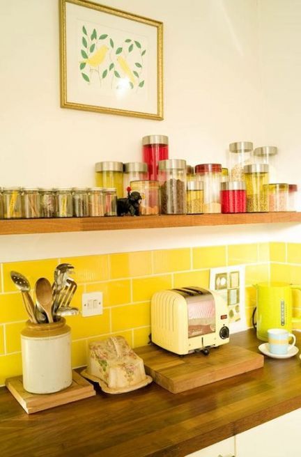 a bright yellow kitchen island backsplash of subway tiles is a cool accent for your space