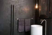 20 a minimalist meets industrial bathroom with a free-standing white round sink