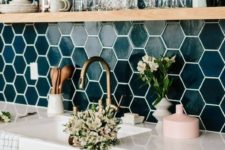 24 a neutral kitchen with a super bold dark green hexagon tile backsplash that wows