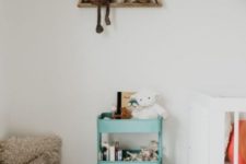 24 an IKEA Raskog cart in tiffany blue is a cool storage unit for a nursery and a colorful detail