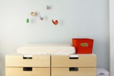 26 an IKEA Stuva storage system doubles as a changing table and looks minimal