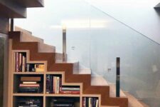 a staircase with built-in bookshelves is a cool idea for a modern home, you will save a lot of space and will get a creative touch to the design