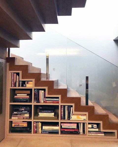 a staircase with built-in bookshelves is a cool idea for a modern home, you will save a lot of space and will get a creative touch to the design