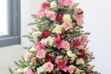 a super romantic Valentine tree with hot pink, blush and neutral fresh flowers looks really beautiful and amazing