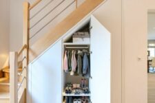 a wardrobe built into the staircase is a cool idea, especially if you don’t have space for a mudroom