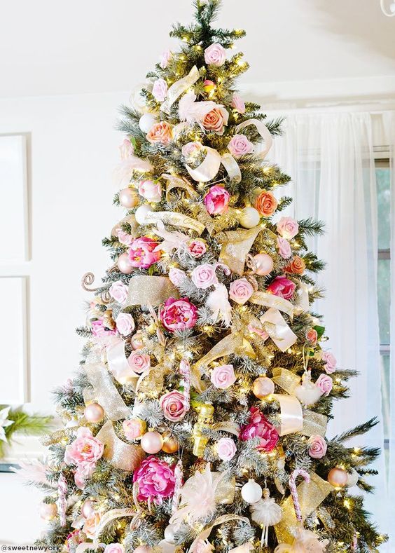 an exquisite Valentine tree decorated with gold ribbons, pink and blush fabric blooms and blush ornaments