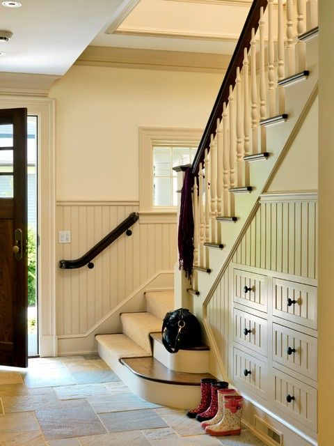 built-in storage drawers are a great idea for a staircase, they can make your space delucttered and provide storage