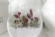 DIY winter terrarium with faux snow and faux plants