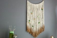 DIY gold dipped yarn hanging with wooden beads