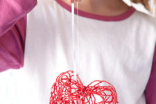 DIY red Valentine heart ornaments with cornstarch glue