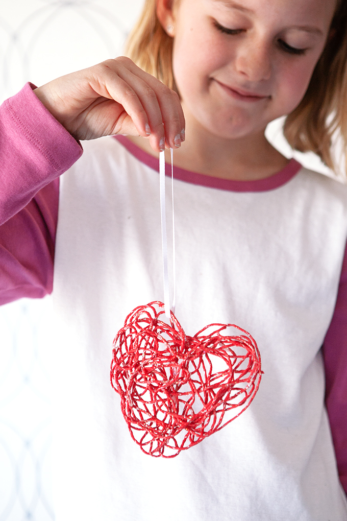 DIY red Valentine heart ornaments with cornstarch glue (via somethewiser.com)