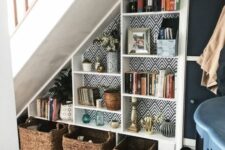 open storage shelves and cubbies are a great idea for the under the stairs space, add a pendant lamp