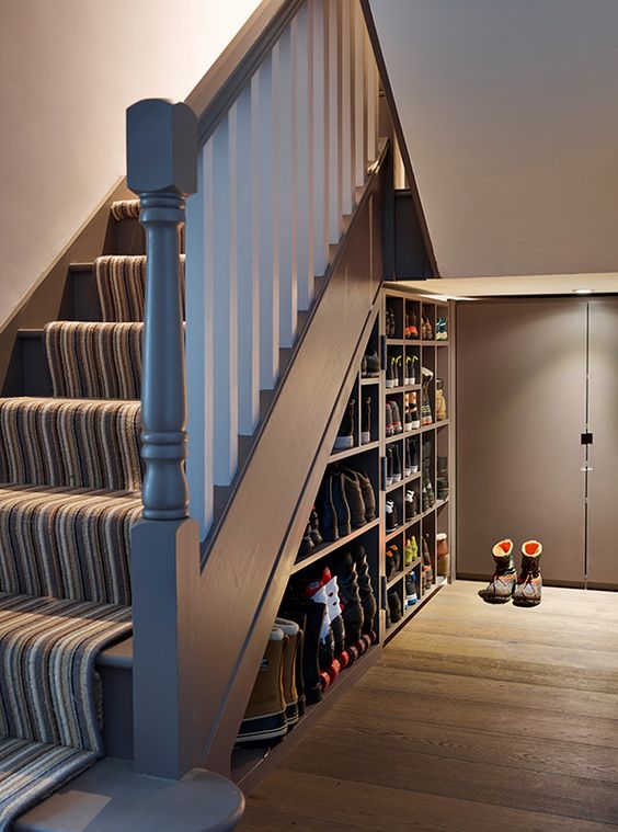 open storage shelves for shoes or other stuff will be a great idea for a staircase
