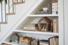 open storage shelves in the staircase will let you not only store but also display various stuff in a cool way