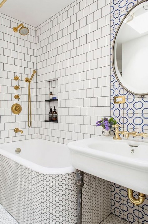 neutral tiles – square ones and penny hex tiles plus an accent with blue and white mosaic tiles over the sink