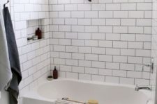 05 white tiles – subway ones on the walls and hex penny tiles on the floor accented with black grout