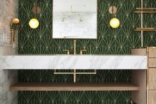 22 bold green and gold art deco tiles on the walls and white marble ones on the floor