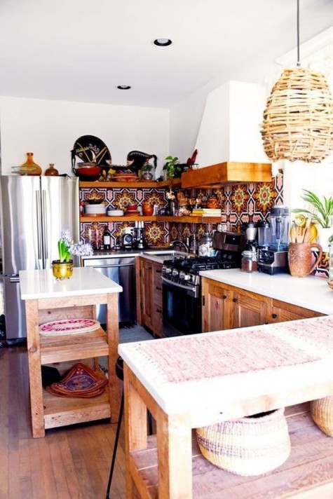 a colorful boho kitchen with a rattan lampshade, a mosaic tile backsplash and wooden furniture