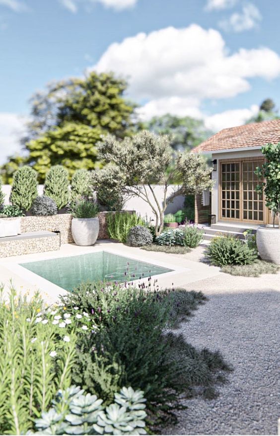 a laconic outdoor space with some greenery, blooms and trees, a gravel yard, a plunge pool is very welcoming
